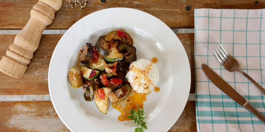 plate from above of cooked vegetables with cheese and fresh herb at 'Eleonas'